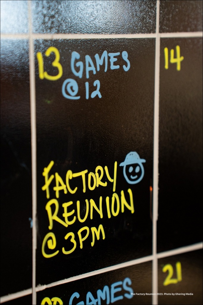 Close up photo of Factory Reunion on our physical calendar of events board.